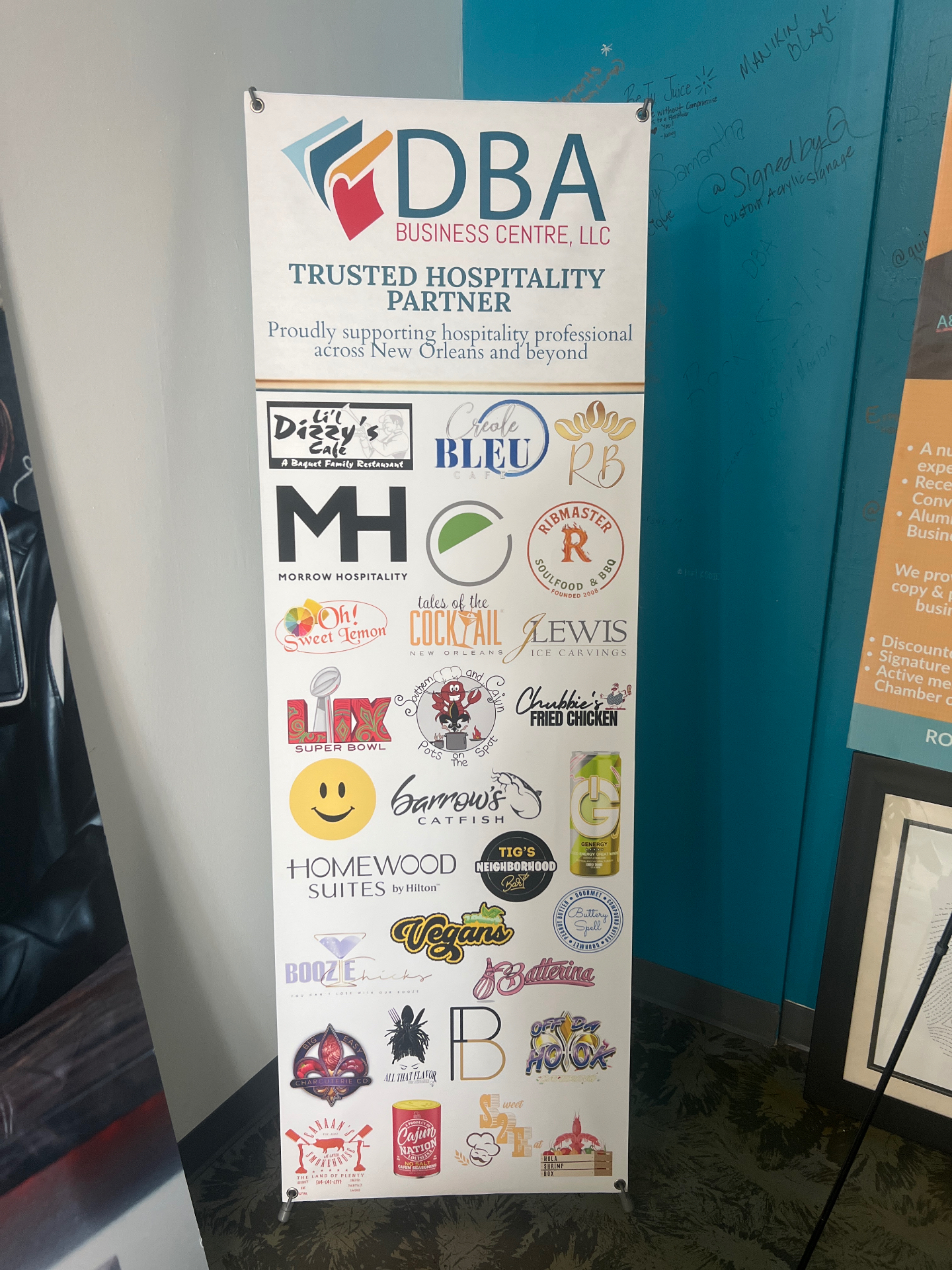 DBA Business Centre Trusted Hospitality Partner banner featuring client logos